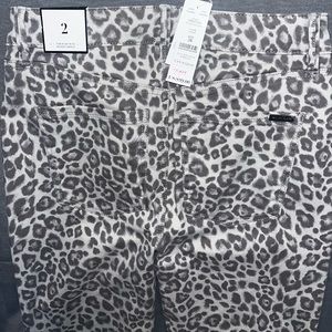 White House Black Market skinny jeans with tags.